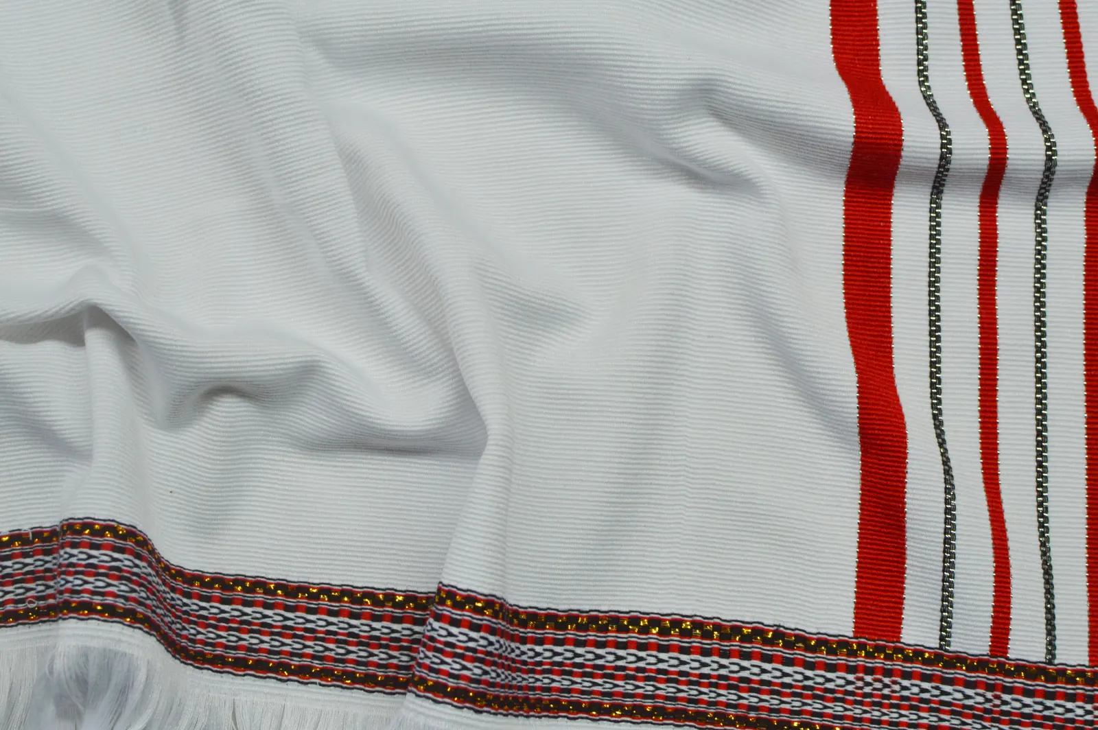 White sarong with red border